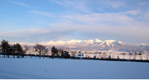 雪と十勝岳連峰